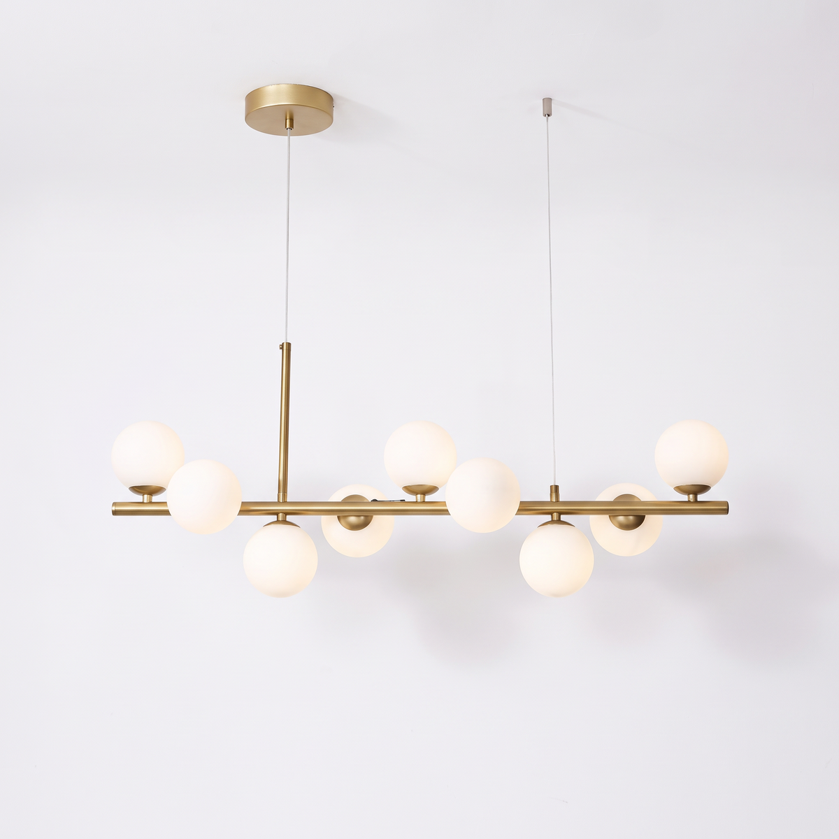 Nine head glass ball chandelier, gold body with milk white glass shades