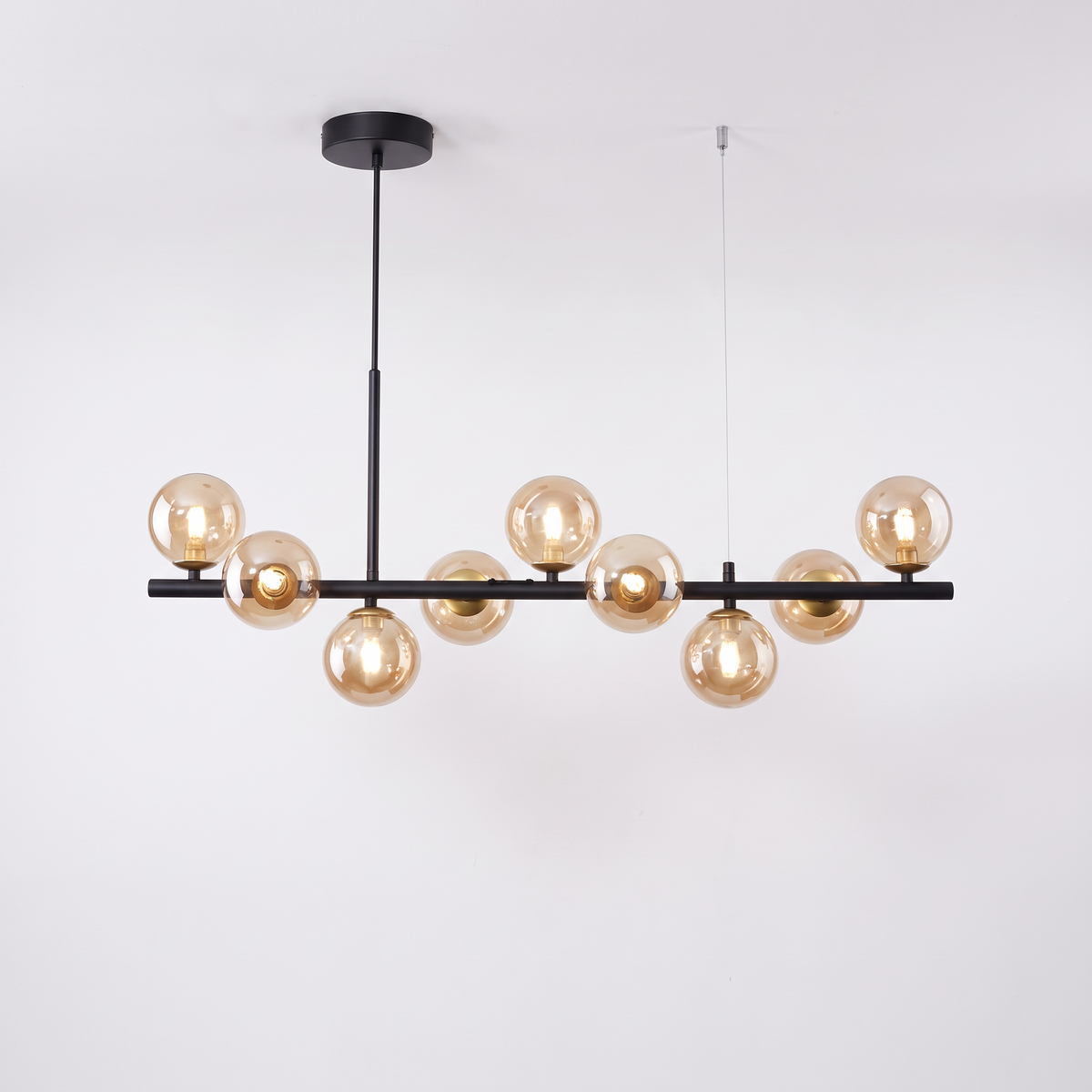 Nine head glass ball chandelier, black body with cognac glass shades
