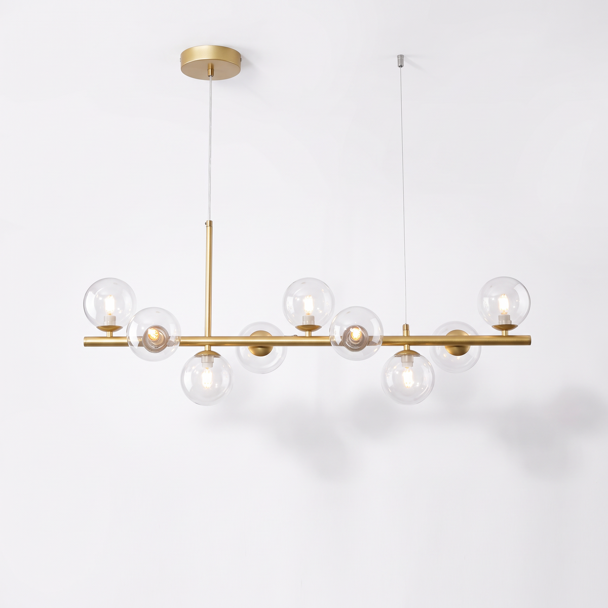 Nine head glass ball chandelier, gold body with clear glass shades