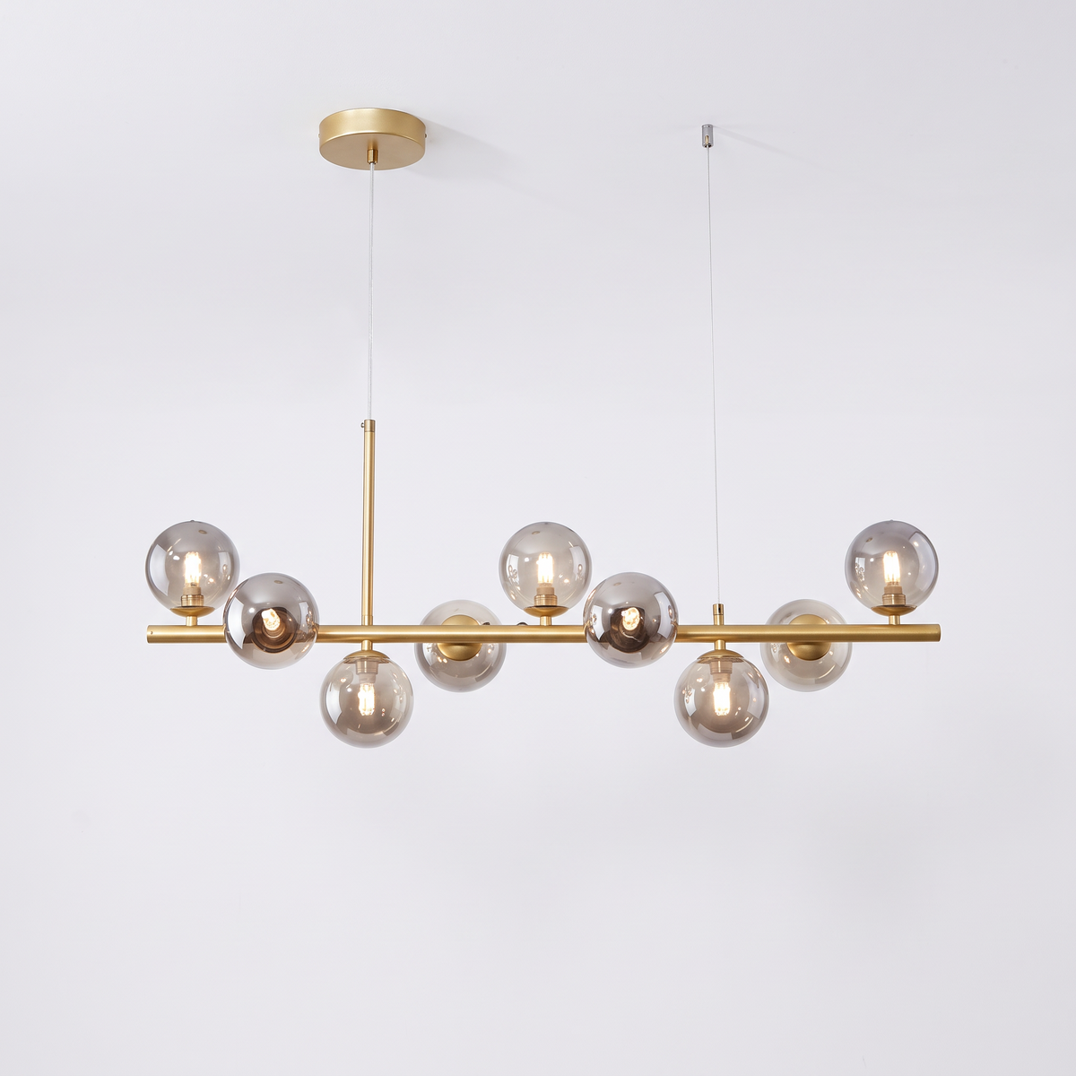 Nine head glass ball chandelier, gold body with smoky grey glass shades